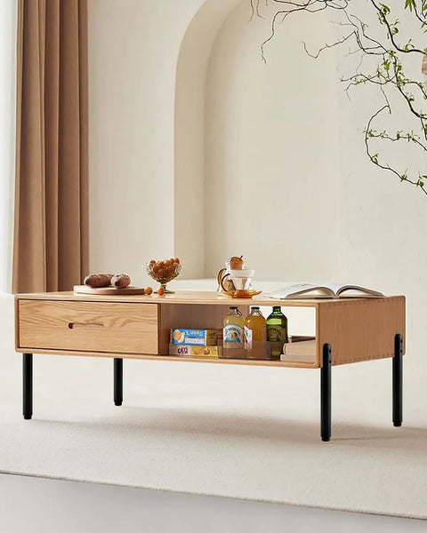 Game Changer Height Adjustable Cabinet Legs And Heavy Duty Furniture Support Feet Black Metal Dresser Risers on a modern coffee table