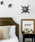 Black Star Flush Mount Ceiling Light With Dope Mid Century Vibe, Modern Ceiling Fixture for bedroom, above art and side table.