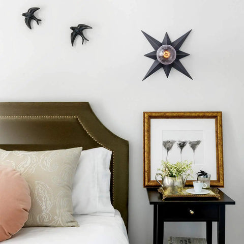 Black Star Flush Mount Ceiling Light With Dope Mid Century Vibe, Modern Ceiling Fixture for bedroom, above art and side table.