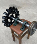 Low Speed Hydraulic Turbine Blades With Bearing Housing Oblique Impact Type on a stool, showing metal impeller and bearing rods.