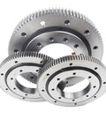 Heavy Duty External Gear Turntable Bearing Slewing Ring Single Row Drive Support stacked in three sizes, showcasing durable steel construction.
