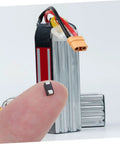 100 Piece Rectifier Diode Assortment Kit With High Voltage Power Supply Components For Industrial And Automotive Systems features a finger holding a small diode.