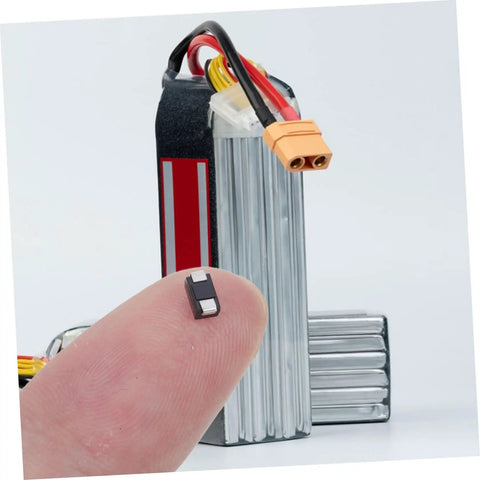 100 Piece Rectifier Diode Assortment Kit With High Voltage Power Supply Components For Industrial And Automotive Systems features a finger holding a small diode.