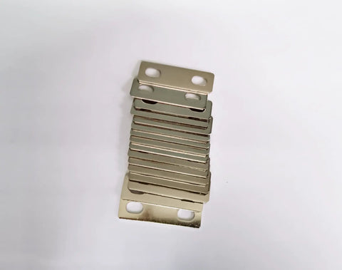 Badass 16 Pack LiFePo4 Bus Bars Nickel Plated Copper Heavy Duty Straps For Lithium Cells stacked, showing nickel finish and hole design.