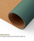 Close-up of rolled Dual Sided Desk Mat with Eco Friendly Cork and PU Leather Surface for Office and Home Large 90 cm by 43 cm Desk Pad Perfect For A Big Mouse Pad And A Slick Desk Setup Dark Green