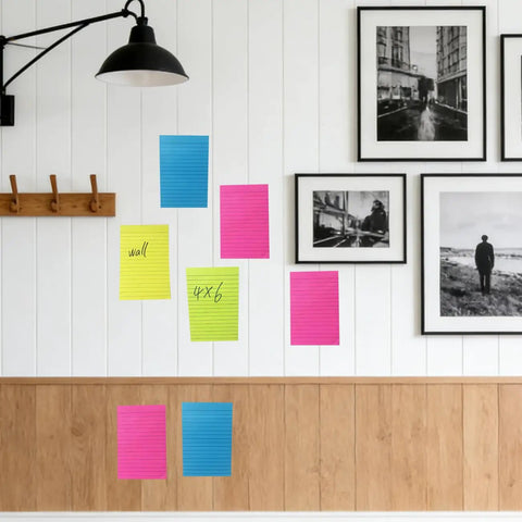 Huge 4x6 Lined Sticky Notes 12 Pack With 30 Sheets Per Pad, Ultra Sticky Notes in bright colors displayed on wall for reminder use