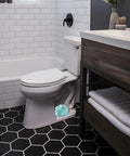 Dope Starfish Toilet Bolt Covers Set Of Two Slick Ceramic Light Blue Screw Caps For Easy Bathroom Decor Swap That Brings Awesome Chill Vibes To Your Daily Routine, displayed near toilet in modern bathroom.