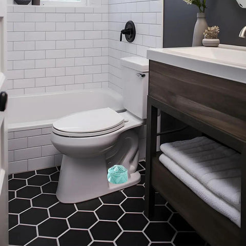 Dope Starfish Toilet Bolt Covers Set Of Two Slick Ceramic Light Blue Screw Caps For Easy Bathroom Decor Swap That Brings Awesome Chill Vibes To Your Daily Routine, displayed near toilet in modern bathroom.