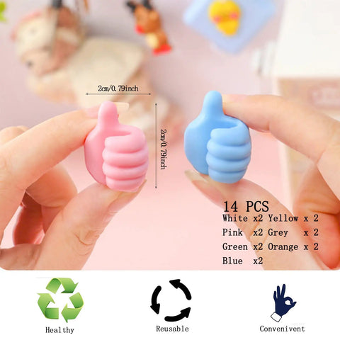Hands holding pink and blue silicone thumbs from 14 Pack Self Adhesive Thumb Cable Organizer Clips No Punching Silicone Wall Hooks