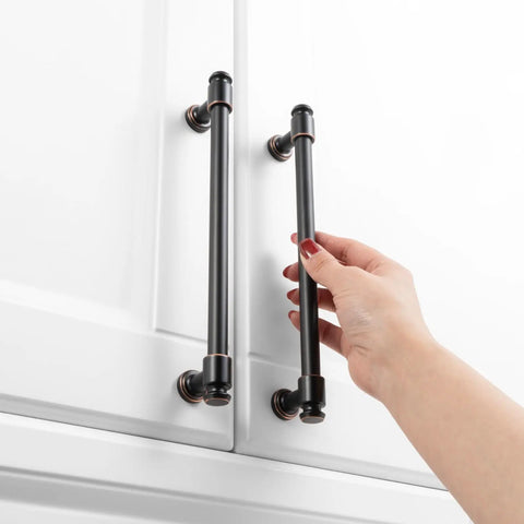Hand holding one of 10 Pack 7.5 Inch Oil Rubbed Bronze Cabinet Pulls Handles For Cabinets Drawers Dresser Cupboard Bedroom Bathroom Solid Metal Hardware