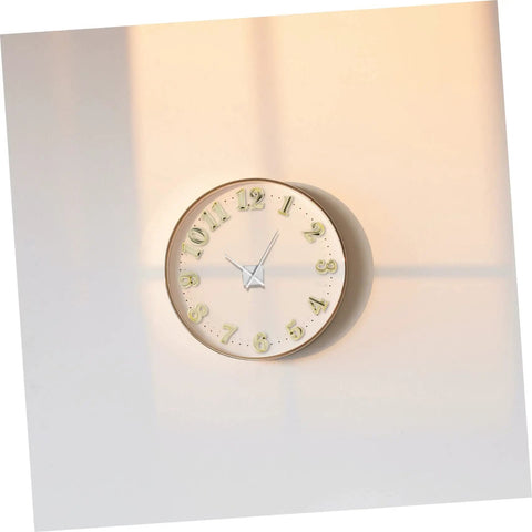 Wall clock displaying adhesive gold Arabic numerals, a part of Self Adhesive Gold Clock Numerals Kit With Arabic And Roman Numerals For Easy DIY Wall Clock Repair Adhesive Backed Replacement Parts Sturdy Gold Finish Ideal For Quick Clock Face Fix And Custom Timepiece Makeover.