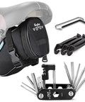 14 In 1 Bike Repair Tool Kit With Under Seat Saddle Bag For Road Mountain And Commuter Bikes Includes Chain Tool Hex Keys Tire Levers Wrench Set And Multitool Essentials For Quick On The Go Bike Maintenance, featuring tools displayed next to a black saddle bag under a bike seat.