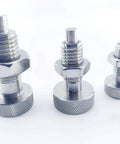 Three stainless steel retractable spring plungers M16x2 with knurled grips for industrial equipment and machinery use.