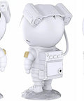 Three views of an astronaut figure for Star Projector Galaxy Night Light With Nebula Effects And Green Stars, Remote And Timer.