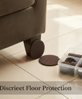 Round Furniture Felt Pads Self Adhesive Brown Floor Protectors under couch leg on tile floor with storage box visible.