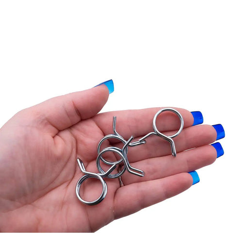 Person holding metal extension hoses from Front Load Washer Water Valve Replacement Kit With Three Coils And Extension Hoses.