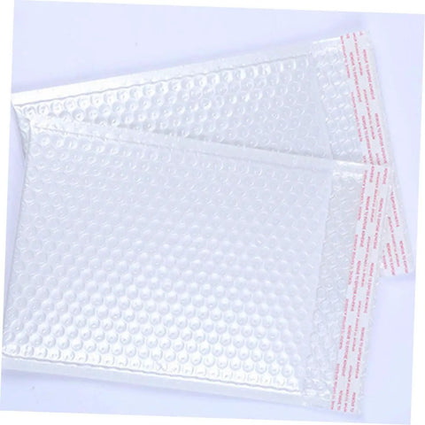 Close-up of 25 Pack White Bubble Mailers Self Seal Padded Envelopes 24x35+5cm Waterproof Shockproof Packaging Bags on a white background.