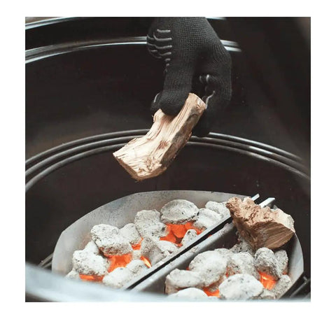 Adding wood to charcoal grill with Heavy Duty Plated Steel Grill Tool Holder Hooks for 18.5 Inch and 22.5 Inch Charcoal Grills.
