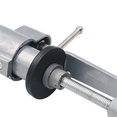 Dead Steady Electric Drill Stand Holder Knockout multifunctional metalworking tool bracket rack close-up of adjustable clamp mechanism.