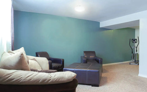 Living room with installed 14 Inch Round LED Flush Mount Ceiling Light, Low Profile Modern Fixture With Dimmable 4000K Cool White.