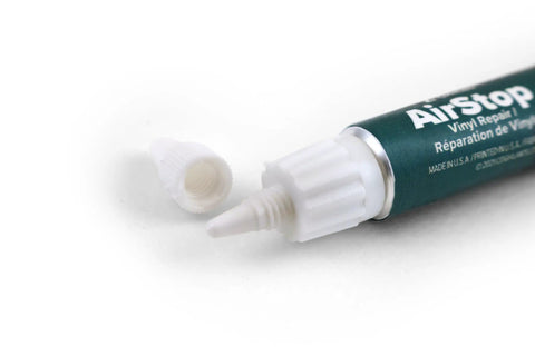 Close-up of Airstop Vinyl Repair Sealant For PVC And Inflatable Repairs Waterproof Flexible Patch Up.