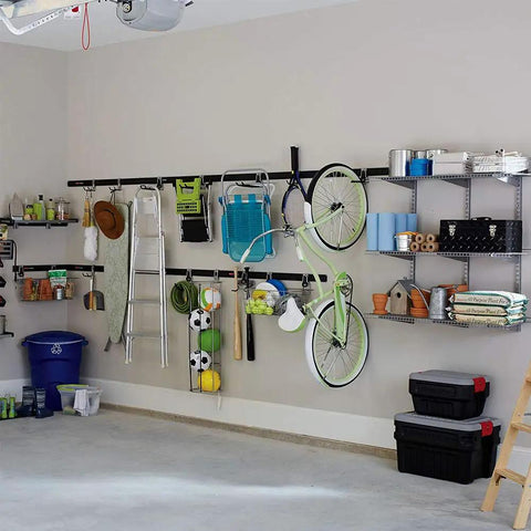 Garage interior with FastTrack Wall Double S Hook Garage Organizer Set, 2 Pack For Hand Tools holding various items on rails and shelves.