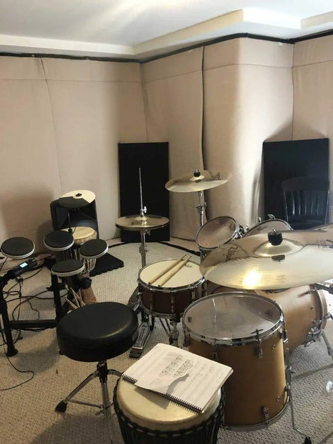 Ditch Junky Foam For This Top Shelf Sound Absorption Sheet Black Sound Dampening Blanket used in music room with drums.