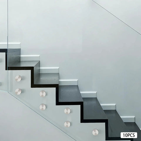 10 Pack 304 Stainless Steel Glass Railing Standoffs With Slick Wire Draw Texture on modern staircase with glass panels.