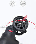 Close-up of a black 360-degree rotating mechanism with a red remove button.