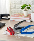 EZ Squeeze Hole Punch For Crafting And School Projects 3 Pack with single hole punch displayed in black, red, and blue on a desk.