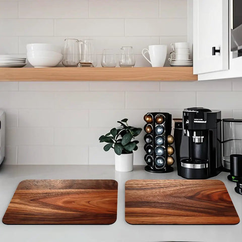 Natural Brown Rustic Wood Grain Dish Drying Mats Two Pack Absorbent Non Slip Kitchen Counter Mats For Coffee Machines And Small Appliances Heat Resistant Pad Cut To Fit 12 By 20 Inches on a kitchen counter.