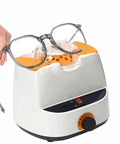 Precision One Touch Eyeglasses Frame Heater Adjustable Optical Warmer Fast Acetate Resin Eyewear Adjuster with glasses in hand.