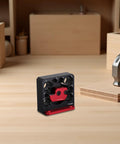 Heavy Duty Adjustable Dowel Cutter Jig For Drill With 8 Precision Holes CNC Aluminum Alloy on a workbench for woodworking projects.