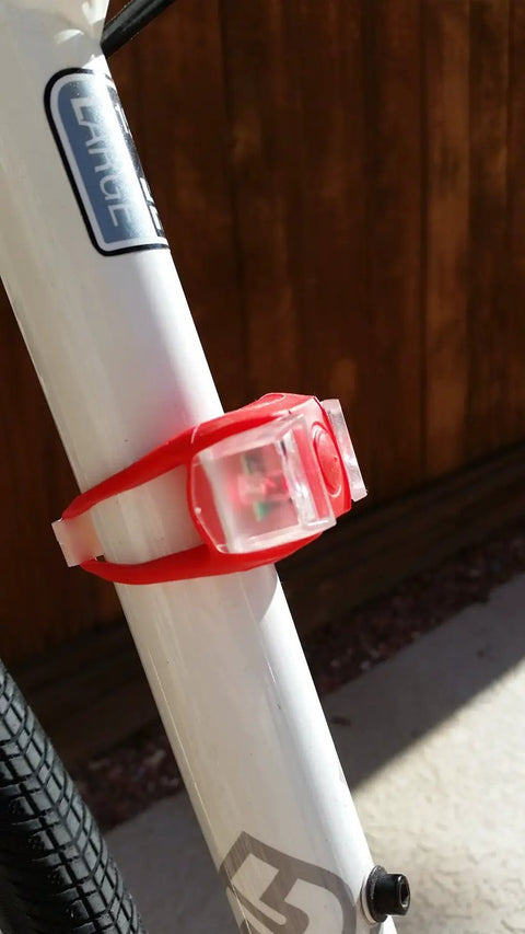 Two Pack Aircraft Aluminum Waterproof 300 Lumen LED Bike Light Set with red taillight attached to bike frame