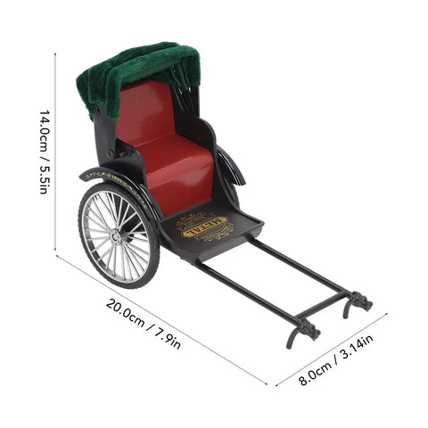 Vintage Red Zinc Alloy Rickshaw Model Toy With Sick Hand Painted Details And A Clean Finish That Hits Different On Any Desk Or Mantle Shelf Perfect Collectible Piece For Home Decor Or Thoughtful Gift Displays, showcasing red seat and green canopy.