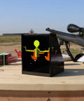 BB Trap With Built In Pellet Collector And Resetting Target For Airguns Durable Easy Setup And Portable Design with rifle nearby