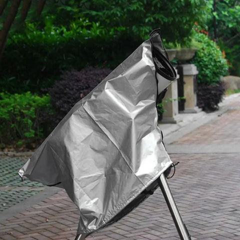 Foldable Telescope Cover With Sun Shield And Rain Guard Made From Weatherproof Oxford Cloth in silver and black outdoors