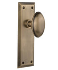 New York Plate And Homestead Door Knob Set With Oval Knob And Long Back Plate in brass finish for vintage door renovation