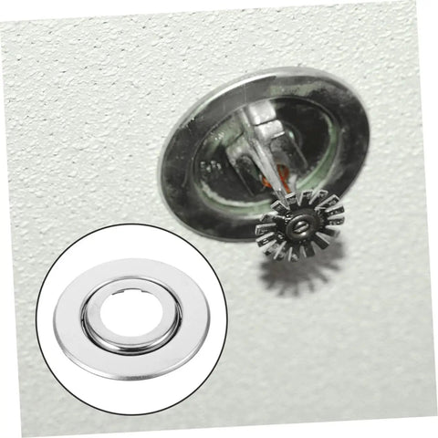 Straight Up Sharp Set 5 Pack Decorative Fire Sprinkler Cover Plates with a stainless steel finish installed on a ceiling.