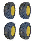 Four Pack Heavy Duty Skid Steer Tires Mounted On 8 Lug Wheels 10x16.5 12 Ply L5 Tread Built Different Ready To Roll For New Holland John Deere Compact Loaders displayed from various angles.