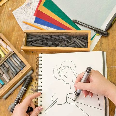 Color Carbon Transfer Paper Set With 50 Sheets In Red Yellow Blue Green White 9x11 Inch Graphite Paper And 5 Stylus Tools shown in use for sketching.