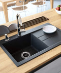 Modern kitchen sink with Stainless Steel Garbage Disposal Flange Kit With 3 Bolt Mount and splash guard installed