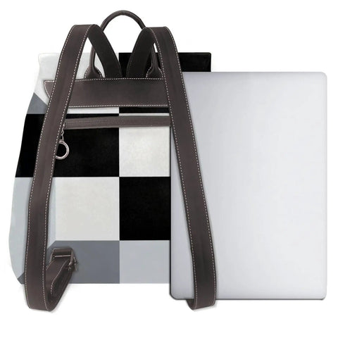 Kick Up Your Daily Fit With This Slick Black And White Piano Grid Womens Leather Backpack Featuring Waterproof Build And Hella Spacious Storage For Travel Or Work, showcasing the bag's zip compartment and laptop slot.