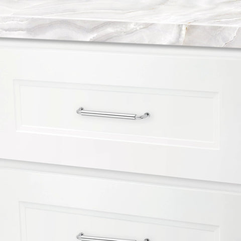 Hollywood Hills 4486 Cabinet Pull 6 Inch Center To Center Solid Brass Hardware installed on white kitchen drawer