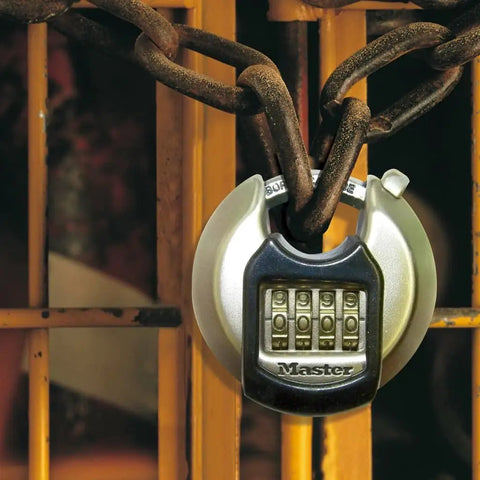 Heavy Duty Disc Padlock With Combination Stainless Steel Outdoor Lock For Storage Units Sheds Garages Trailers Vans And More Weatherproof Tamper Resistant Tough As Nails Built For Daily Use secured on rusted chain