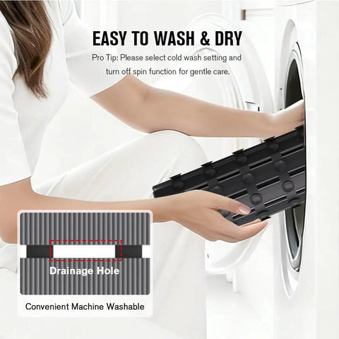 Rock Solid Non Slip Shower Mat With Mega Tight Suction Cups and Rapid Drain Holes being washed in a machine, showcasing easy cleaning.