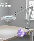 XL Bifocal LED Magnifying Lamp With 7 Inch Acrylic Lens 2.25x And 6x Magnification on desk with adjustable arm and clamp