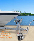 Heavy Duty Electric Trailer Dolly With 5000 Lbs Tow Capacity, Powerful 350W Motor attached to boat trailer at dock.