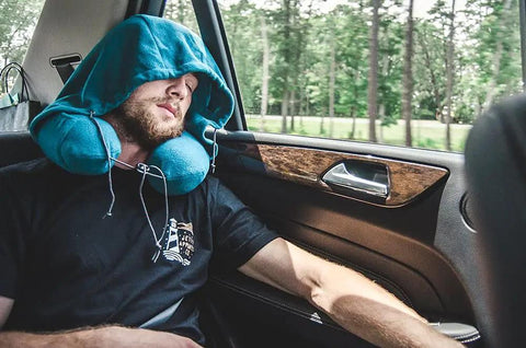 Hooded Travel Pillow With 360 Neck And Head Support, Memory Foam, Adjustable Light Blocking Hood, Ultra Soft Micro Fleece, Carry Bag Included, Built For Car Or Plane Sleep On The Go on man resting in car