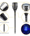Diagram of Outdoor Solar Torch Lights 4 Pack With 99 LED Flickering Flame IP65 Waterproof Garden Yard Decor Realistic Torch Effect For Halloween Patio Porch Pathway Lighting And Festive Vibe, showing components like lampstand, solar panel, and ground stake joint.